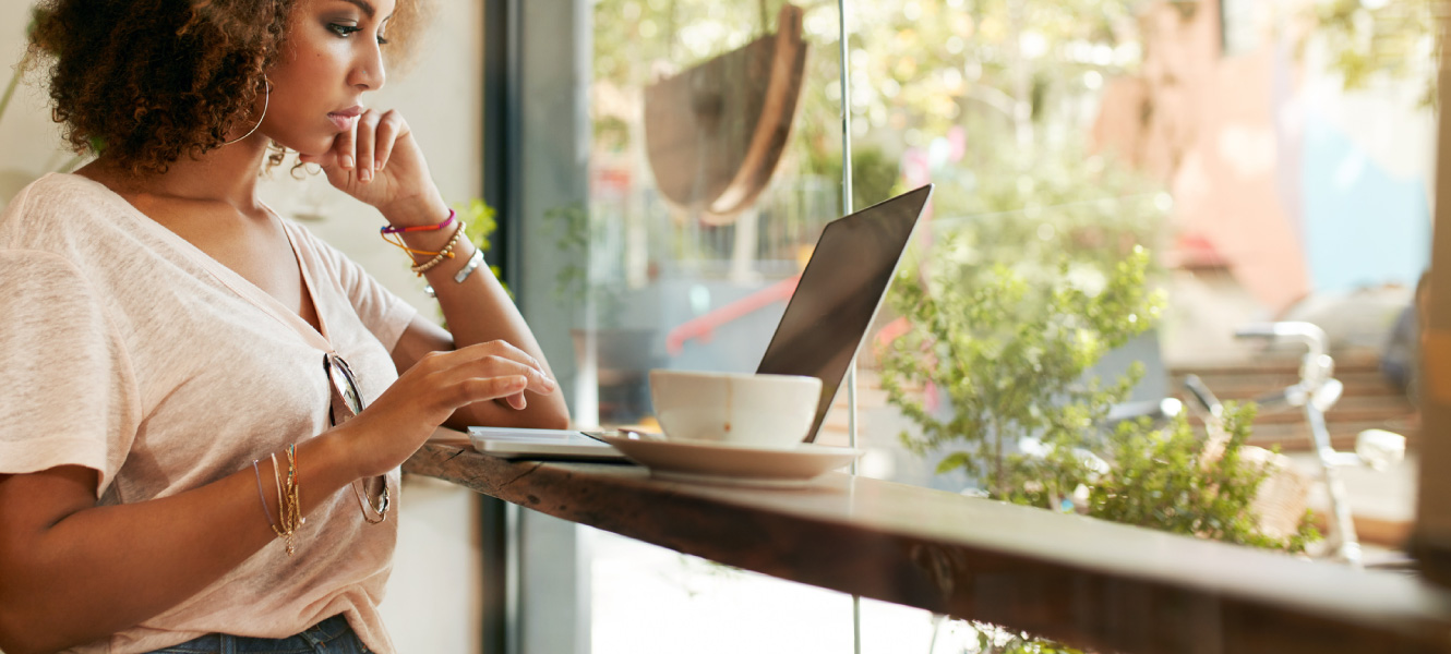 A woman working in a cafe.