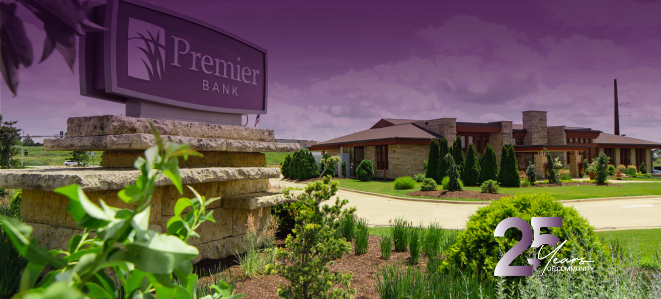 Photo of Premier Bank's Northwest Arterial Branch on a sunny summer day.