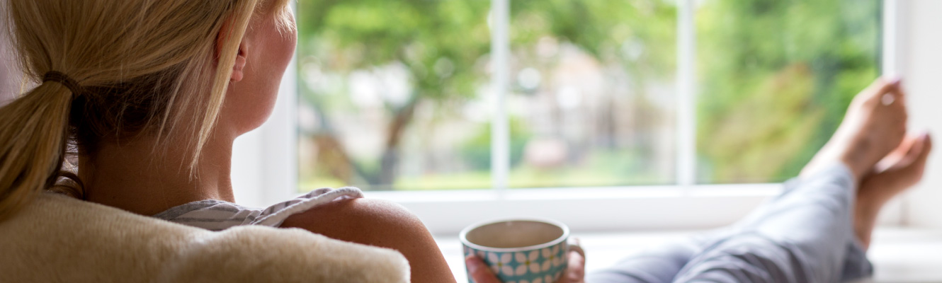 A woman relaxing at home.
