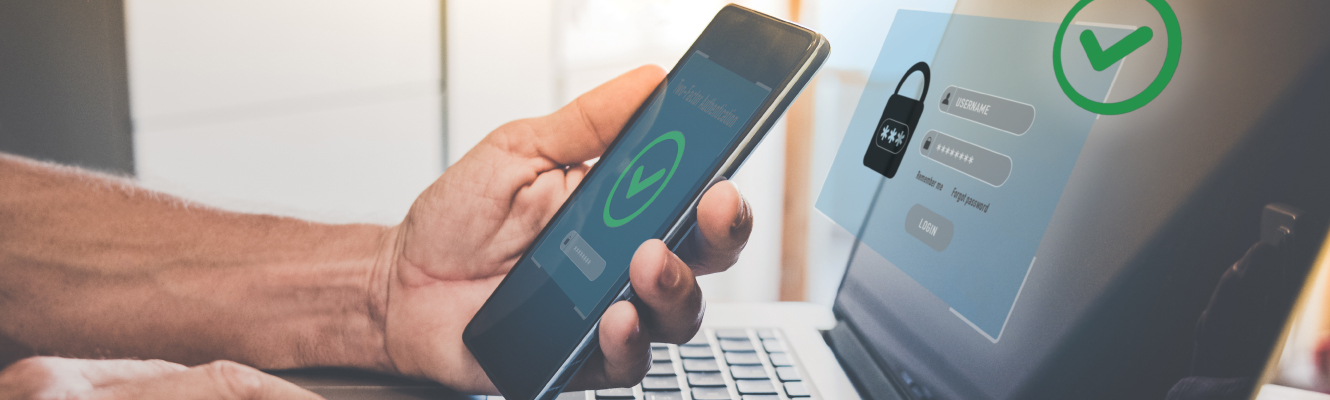 Account holder login into Digital Banking using Multi Factor Authentication on phone and laptop